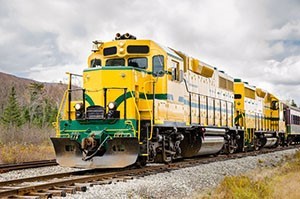 image of a train on tracks in a field